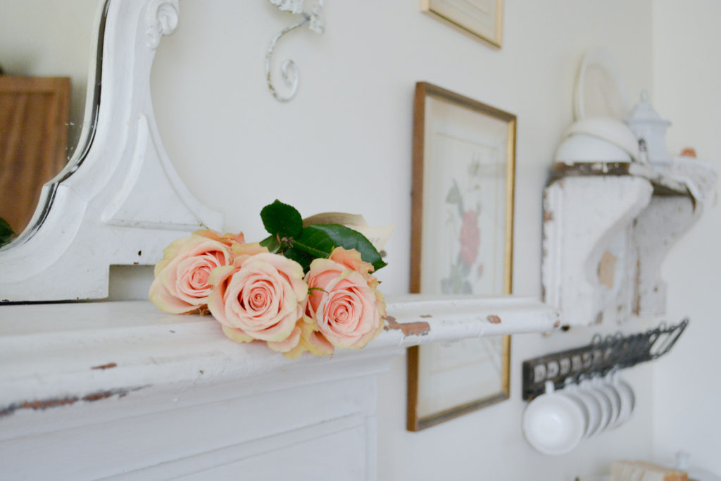 roses on old chippy mantel