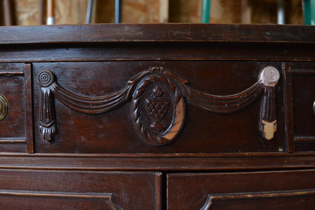 Antique buffet with missing appliques