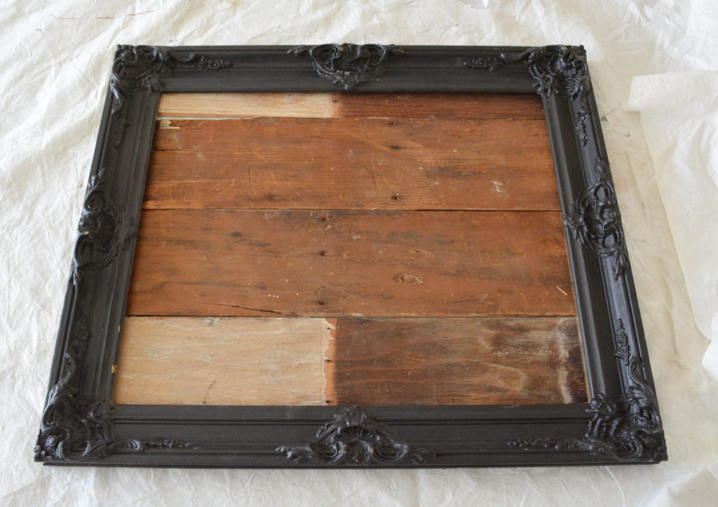 Frame with reclaimed wood slats