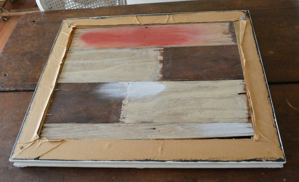 Back of frame with wood slats