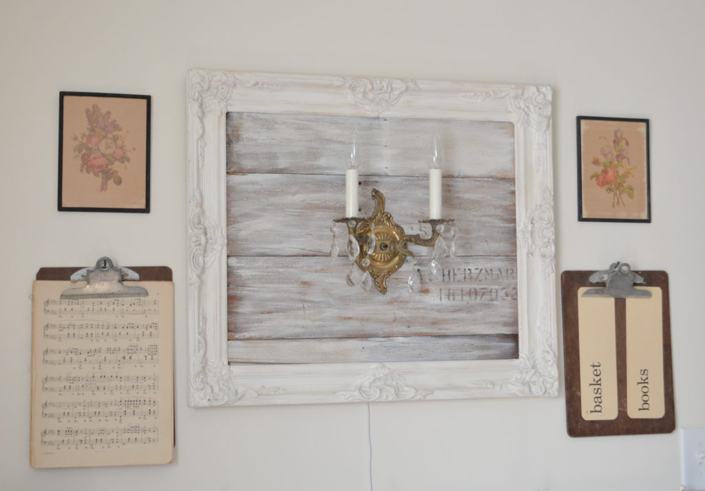 Up cycled frame and reclaimed wood with vintage wall sconce