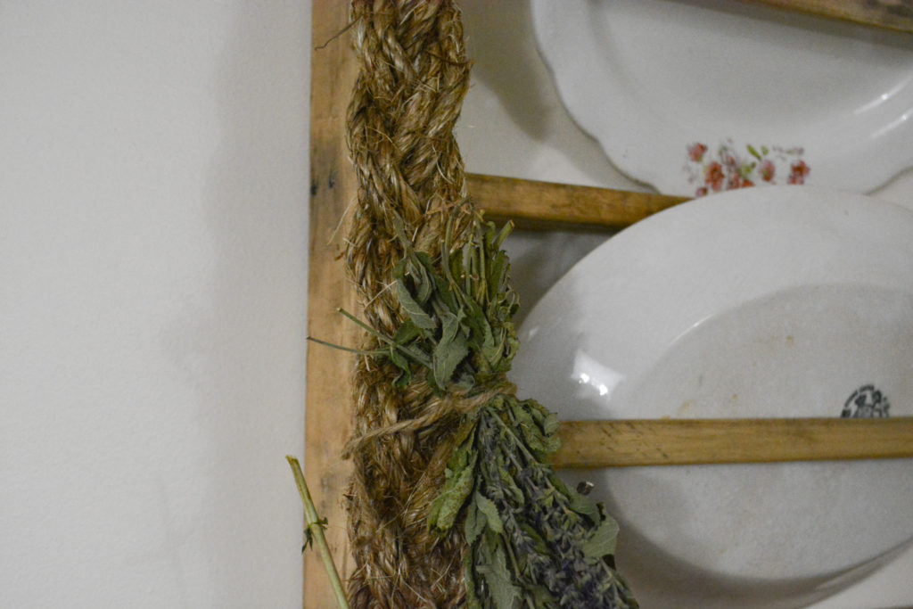 Tie bundles of flowers to braid to dry.