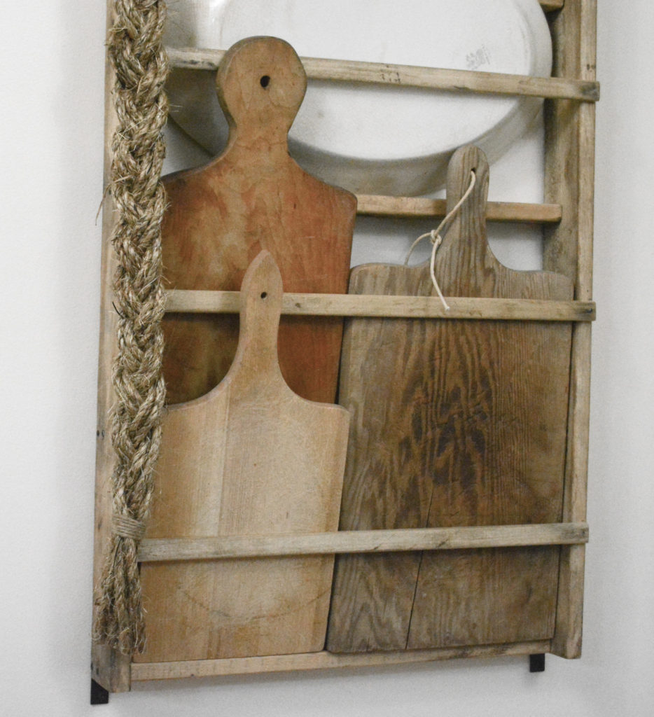 Plate rack with manila rope braid for dried flower hanging.