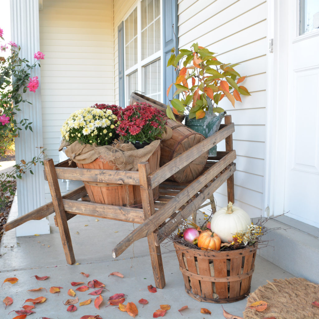 fall front porch with a DIY rustic garden cart
