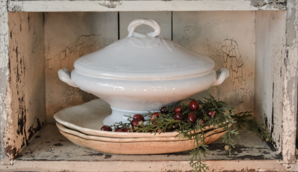 french farmhouse kitchen shelves with ironstone and red and white transferware