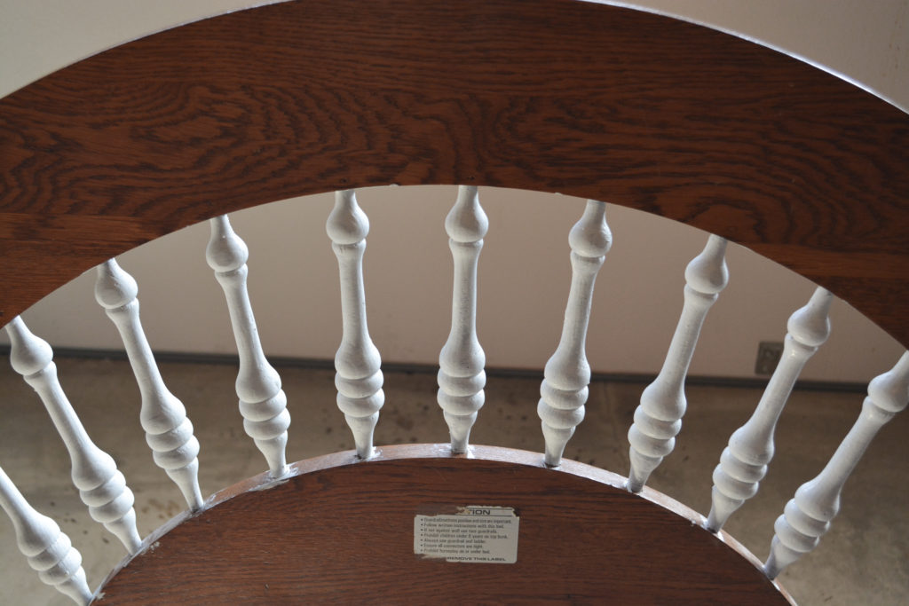 Painted spindles on an old headboard