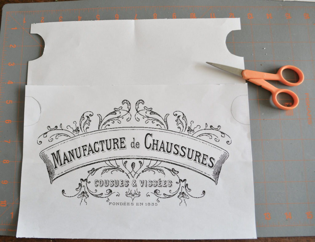 making handle holes in paper for a french tin DIY