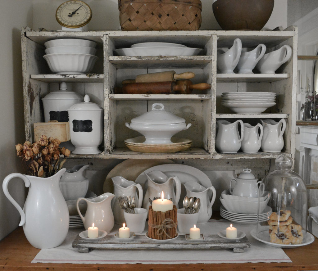 Ironstone and cupboard decorated for fall