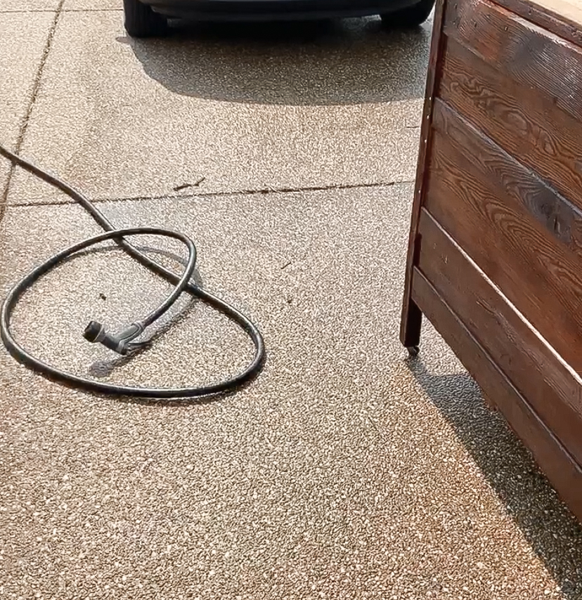 using a hose to clean antique furniture