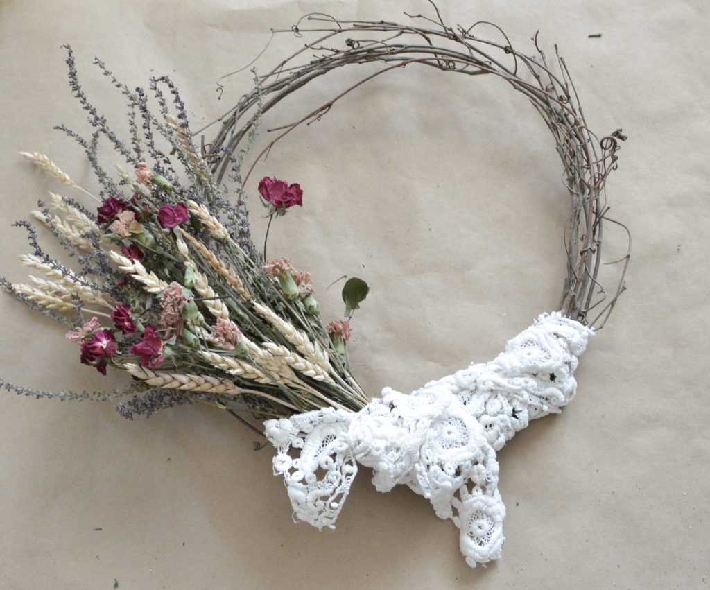 ribbon trim on a dried floral wreath