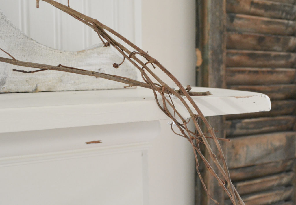 Use Command hooks to hang garland on mantel