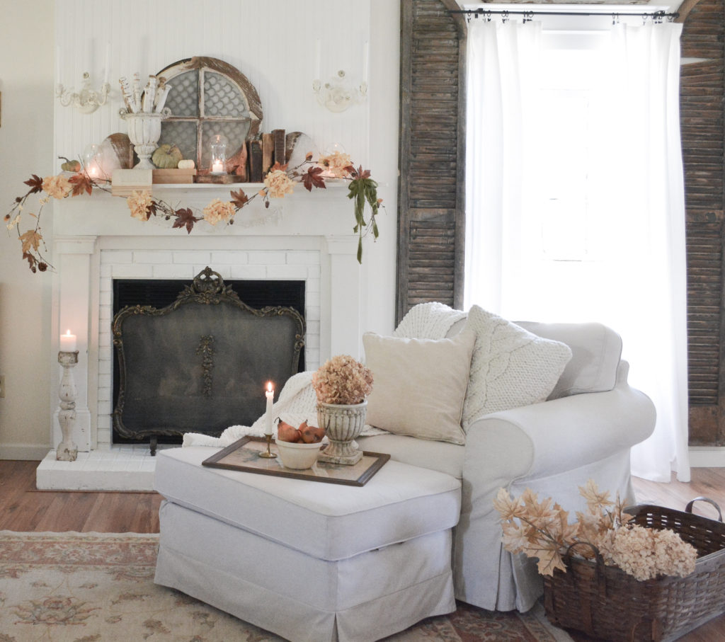 A cottage living room with a DIY fall garland