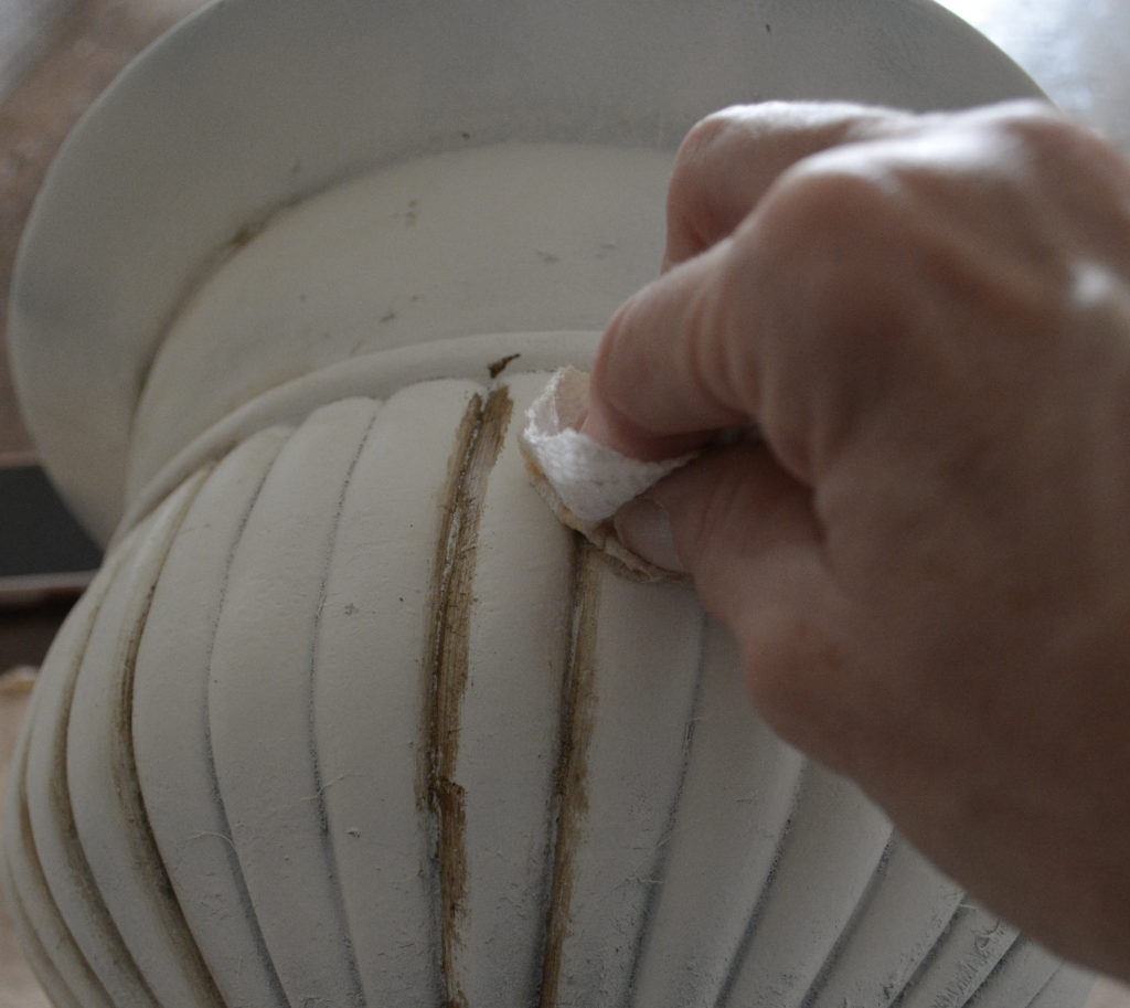 using dark wax to antique an urn