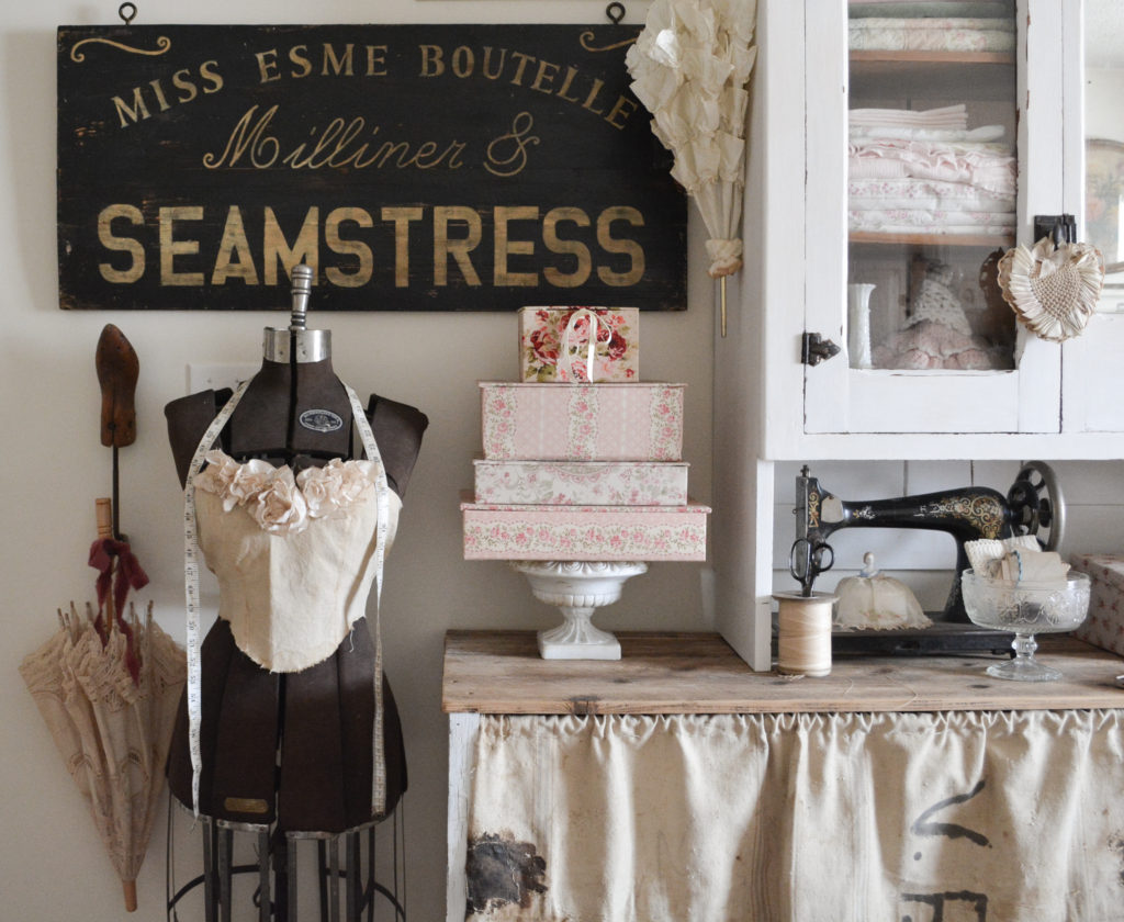 A DIY antique sign with dress form
