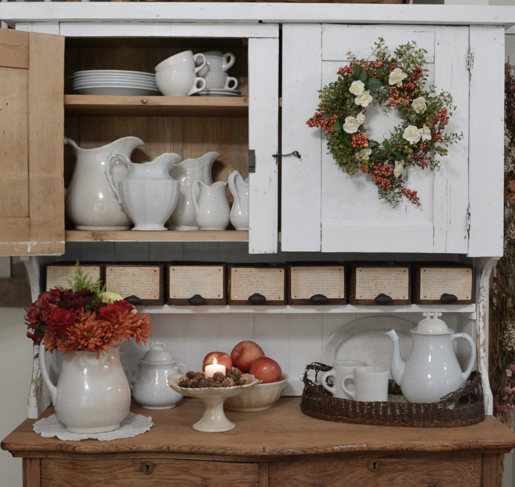 chippy white hutch top with fall decor