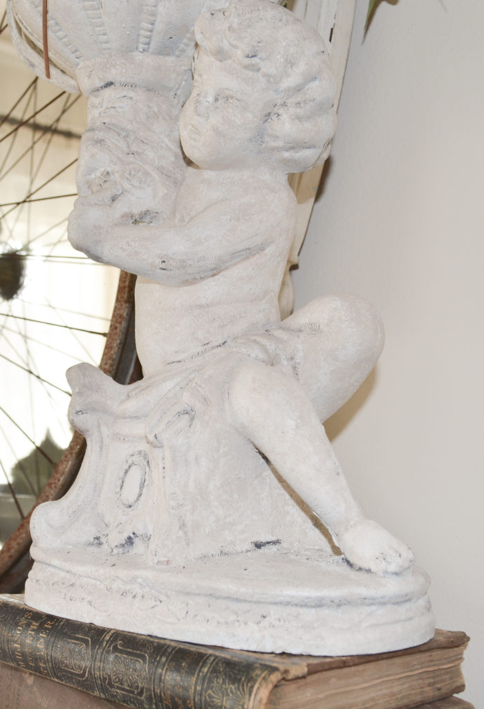 cherub statue with a diy stone painting technique