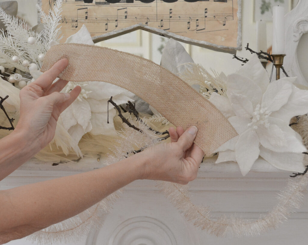 Cut pieces of ribbon to put in floral mantel display