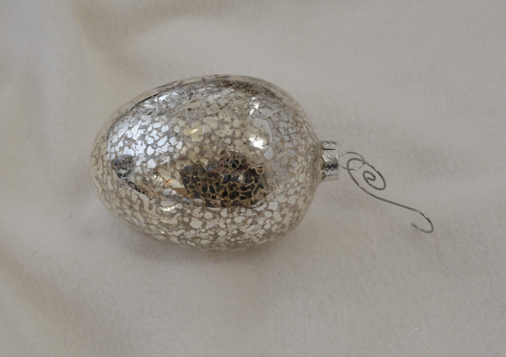 a silver Christmas ornament
