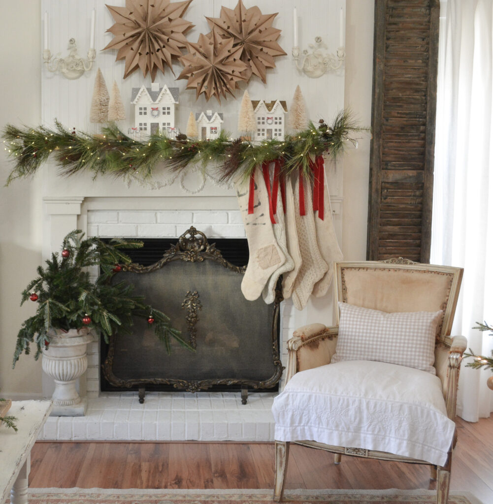 sweater stockings and flour sack stockings hang on diy vintage inspired fireplace mantel