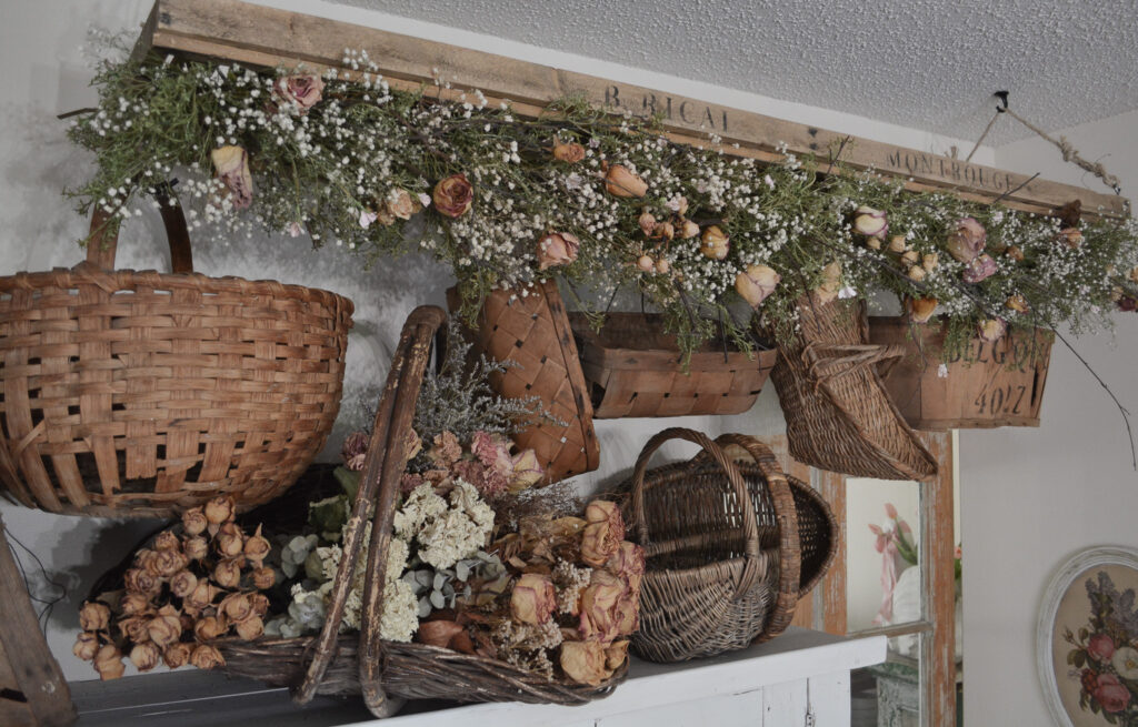 A DIY French flower drying rack filled with baskets