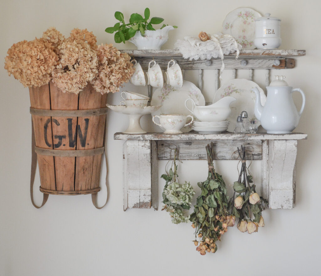 weathered wood shelves and a french picking basket